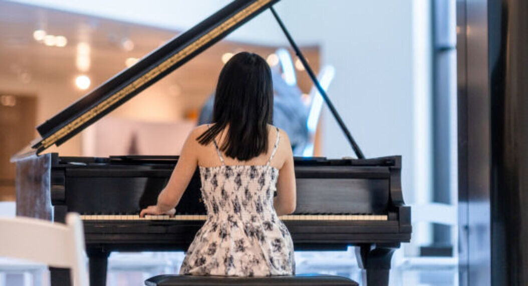 woman playing piano