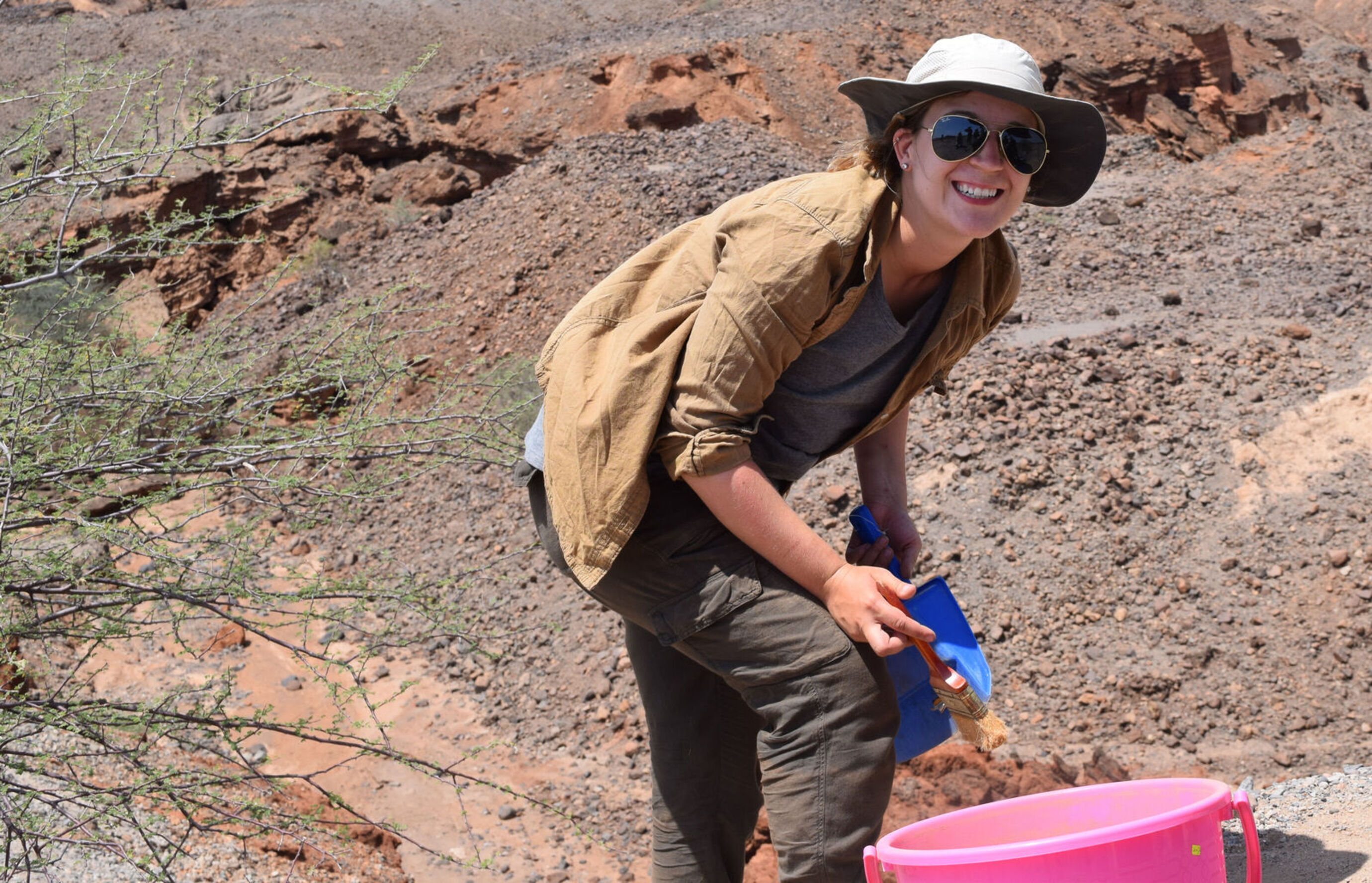 Dr. Elizabeth Sawchuk collecting samples in the field