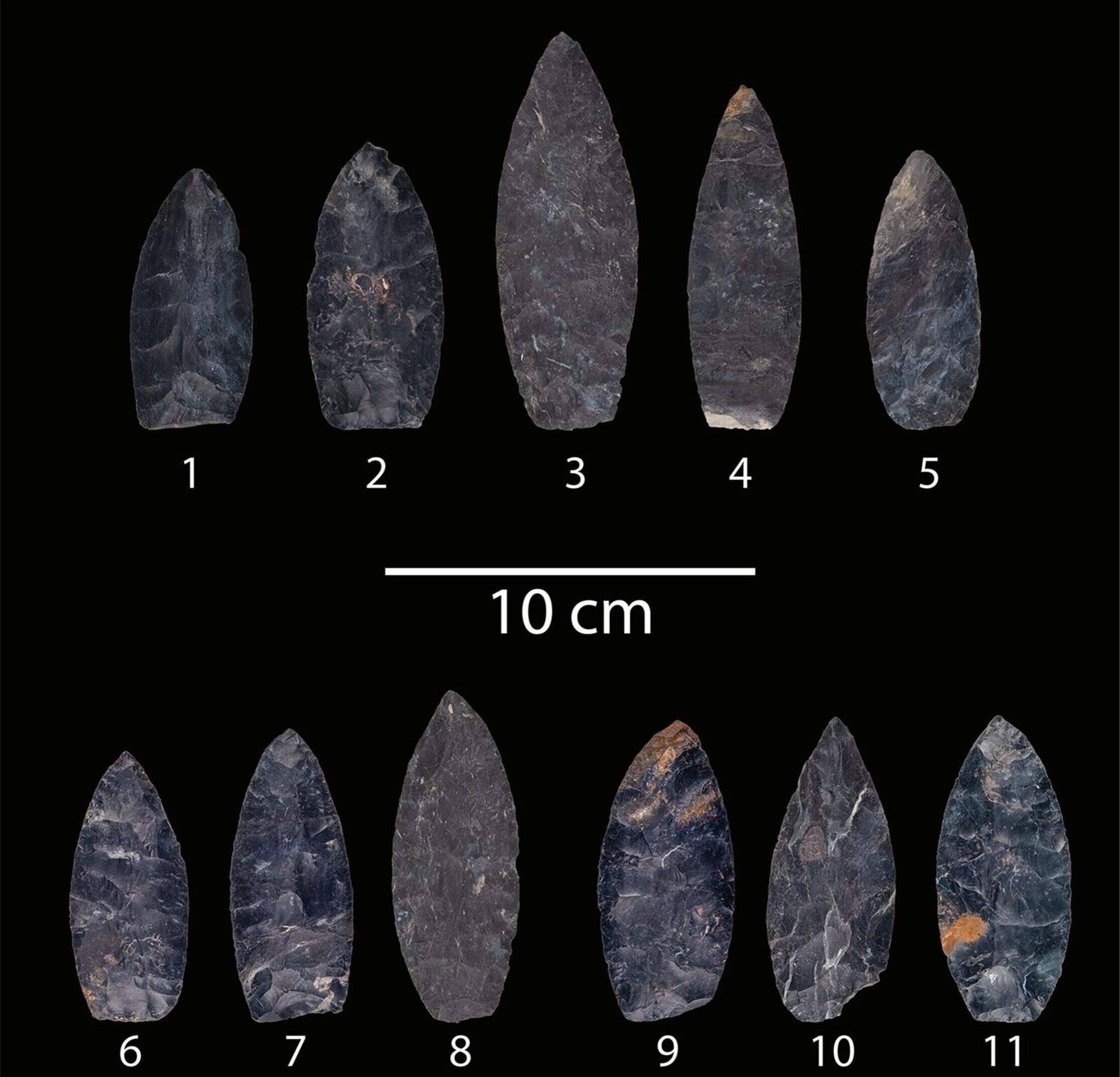 Picture here are the 11 Joshua Cache bifaces recovered in Sugarcreek, Ohio, which are now in the collection of the Cleveland Museum of Natural History.
